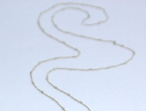 Assembly Ring Styled Pendant on a Long Silver Chain