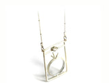 Assembly Ring Styled Pendant on a Long Silver Chain