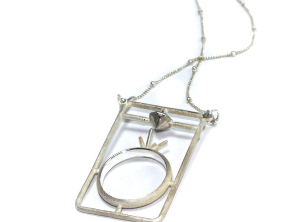 Assembly Ring Styled Pendant on a Long Silver Chain