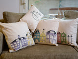 Pompaleh Blue, Yellow + Purple Dutch Street Scene Decorative Pillow