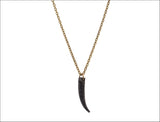 Black zircon on black rhodium