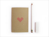 Cross stitch A6 Notebook. Hand stitched neon pink heart