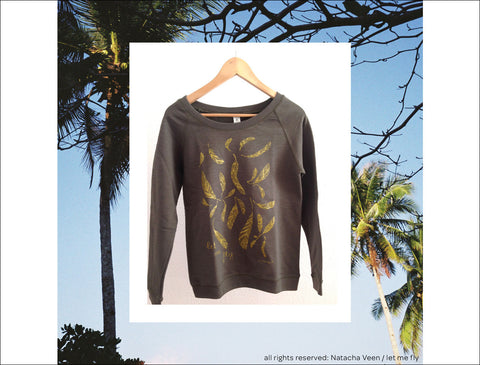 Gold Feathers on an Olive Pullover